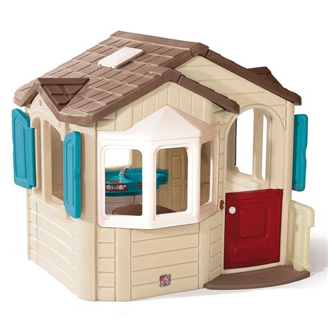 An innovative playhouse with mixed materials and textures will give your backyard play area a unique look. . Step 2 play house